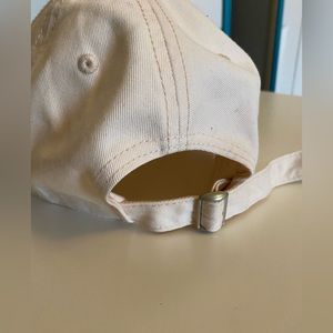 PACSUN hat. “Have a Nice Day” Light pink with light purple letters.